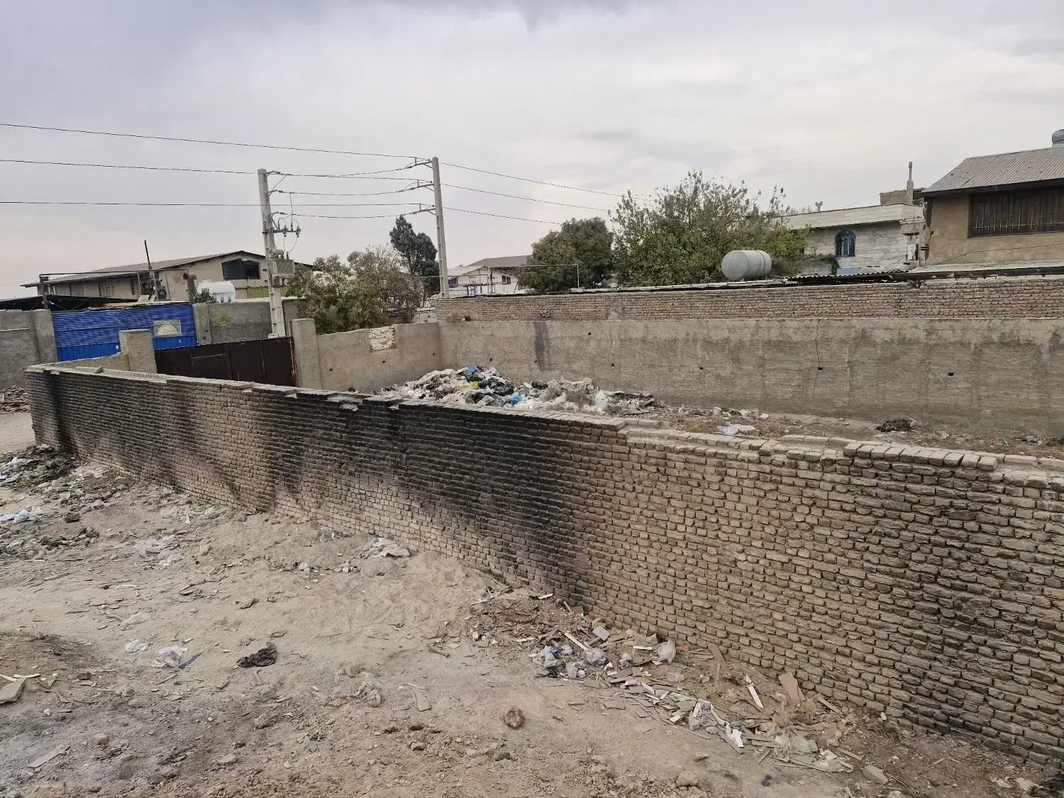 زمین  چهار دیواری شهرک صنعتی قلعه‌میر