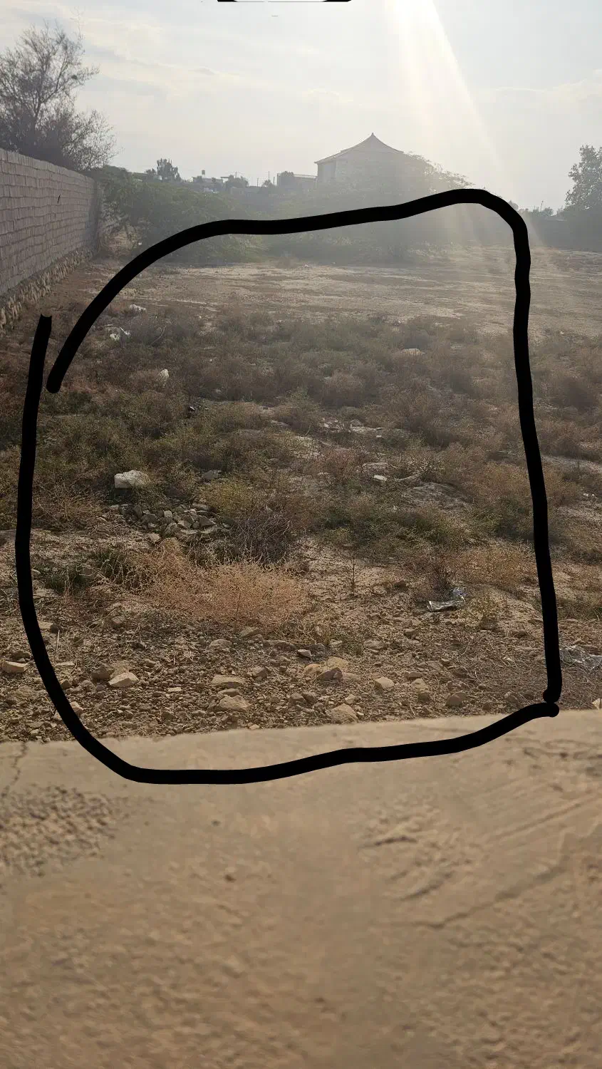 زمین باغی۱۶۰۰ متر بر اتوبان اصلی کنار اردوگاه چاهک