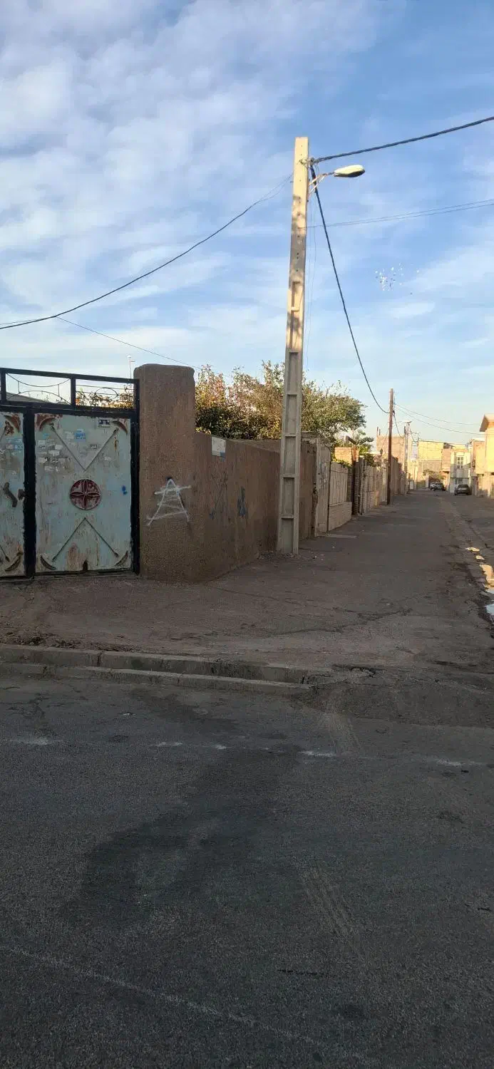 ملک دو نبش علامه امینی
