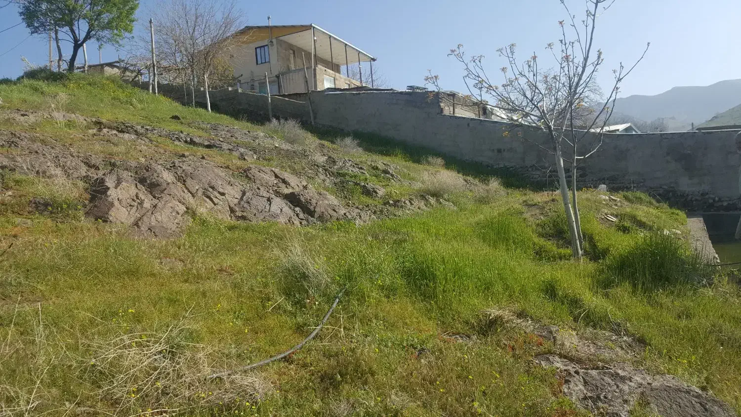۴۰۰متر زمین مسکونی واقع در روستای اتانک