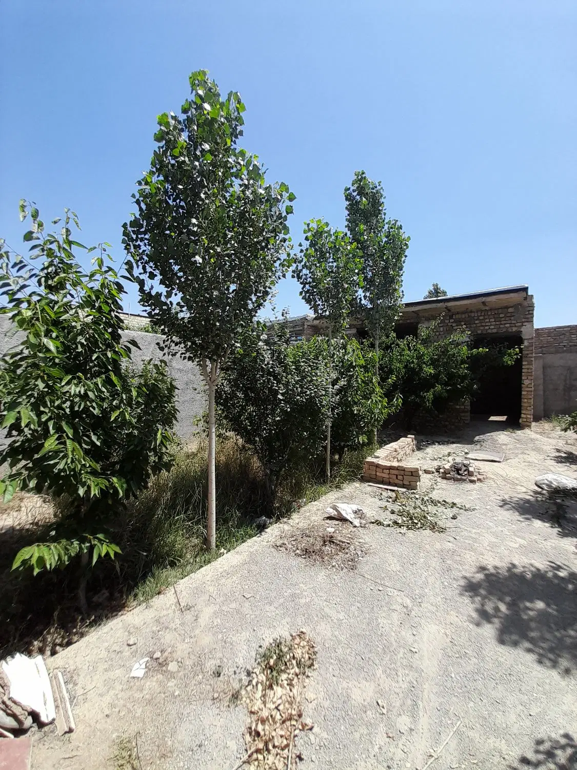 ۲۰۰ متر زمین باغچه فروش و تهاتر  خودرو و ملک