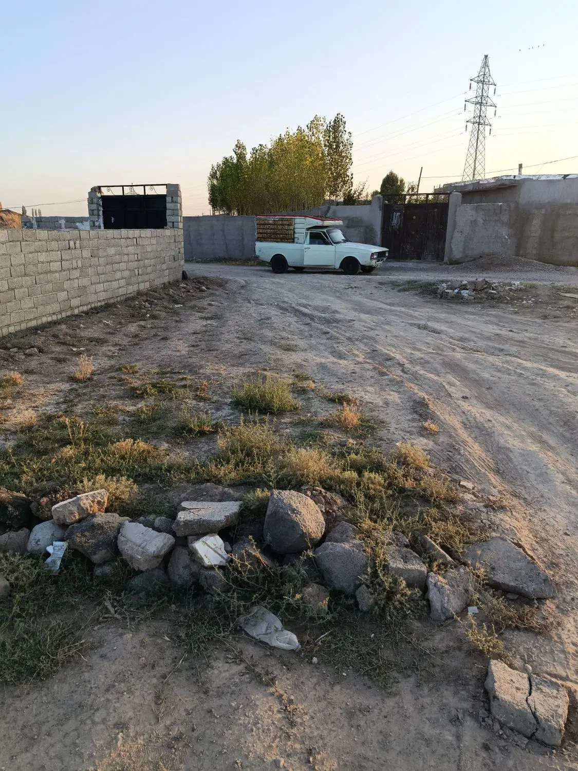 زمین در علی آباد روبروی تالار کامرانی