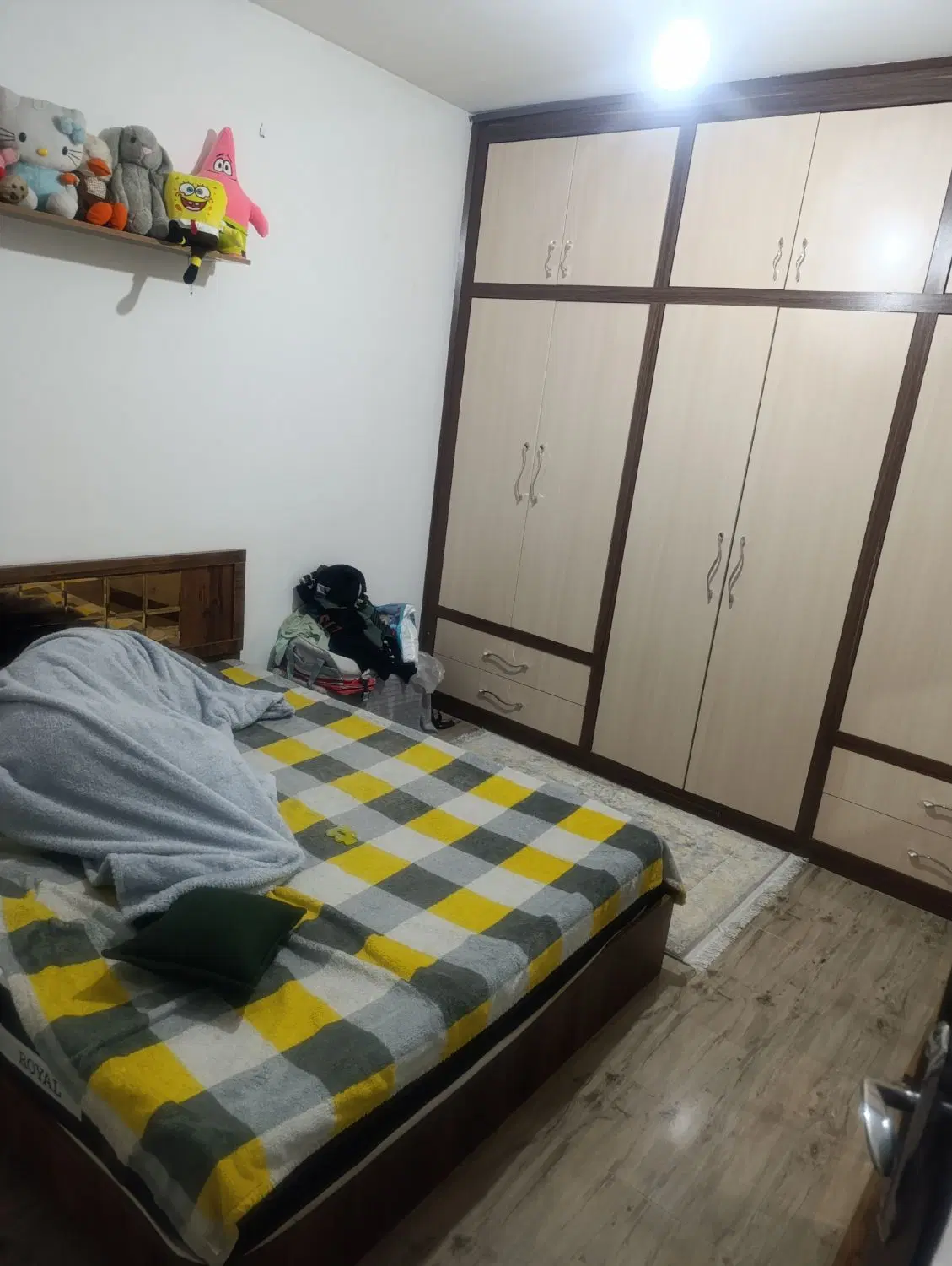 یک واحد آپارتمان طبقه همکف با پارکینگ