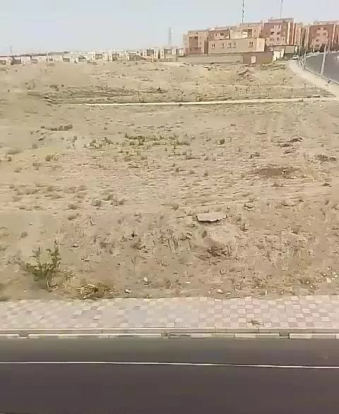 زمین چهار دیواری.ماهدشت روب روی بیمارستان
