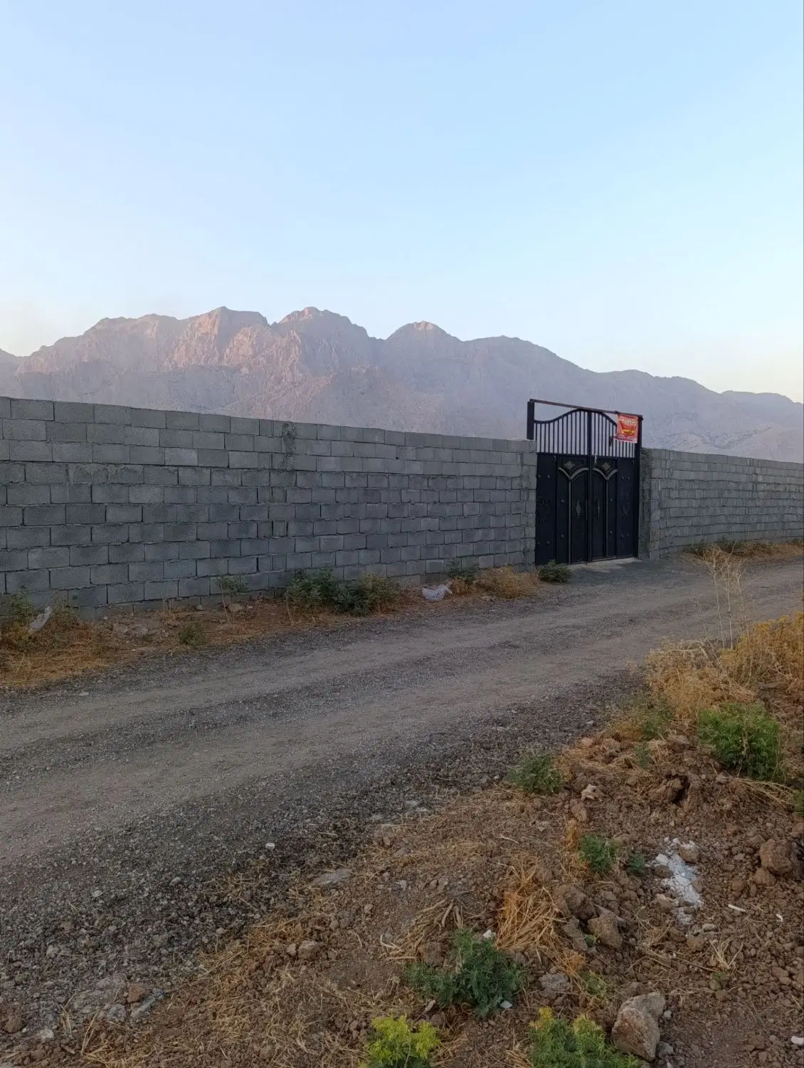 زمین باغ دیوار کشی جاده بیستون