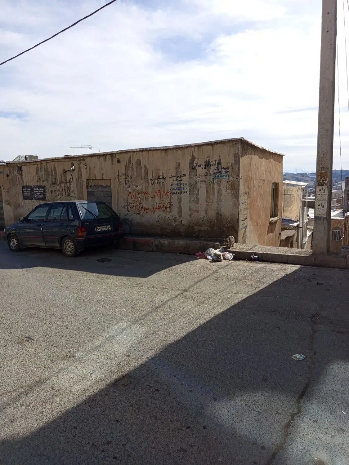 خانه کلنگی خیابان اصلی سیروس