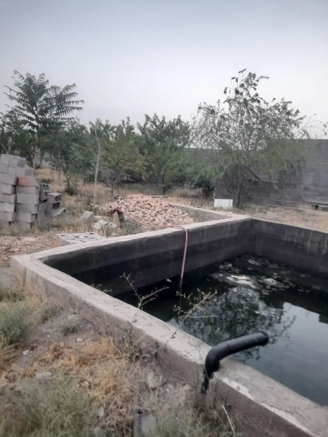 زمین باغی با امتیاز آب و گاز در بافت روستای زاک