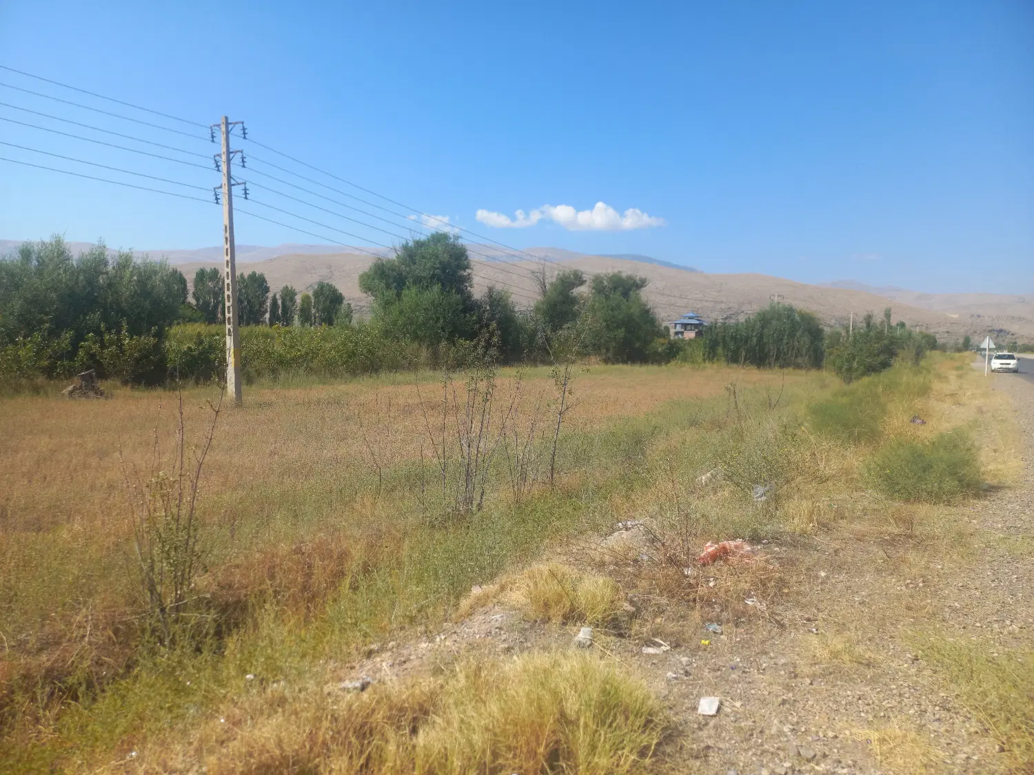زمین کشاورزی بر جاده بین‌المللی روستای قزلداغ