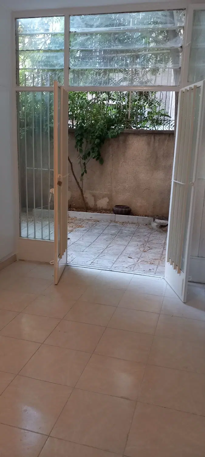 آپارتمان ۲ خوابه همکف حیاط دار سهروردی جنوبی