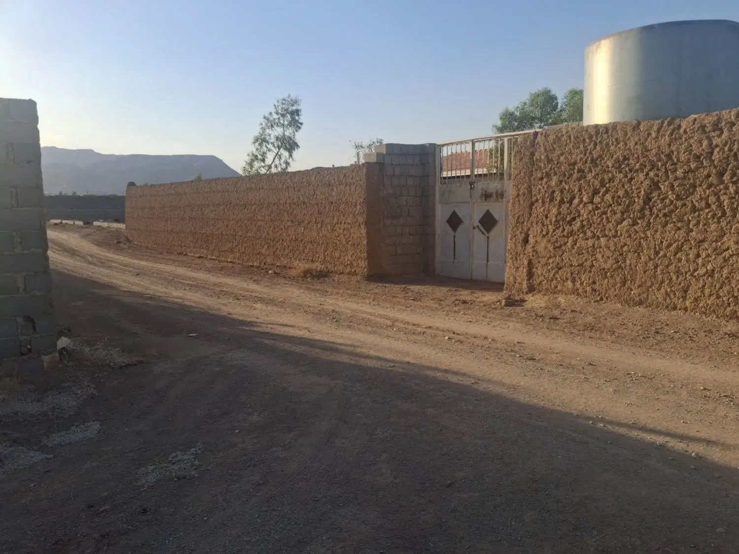 باغ ۱۲۰۰ متر دو درب از دو کوچه