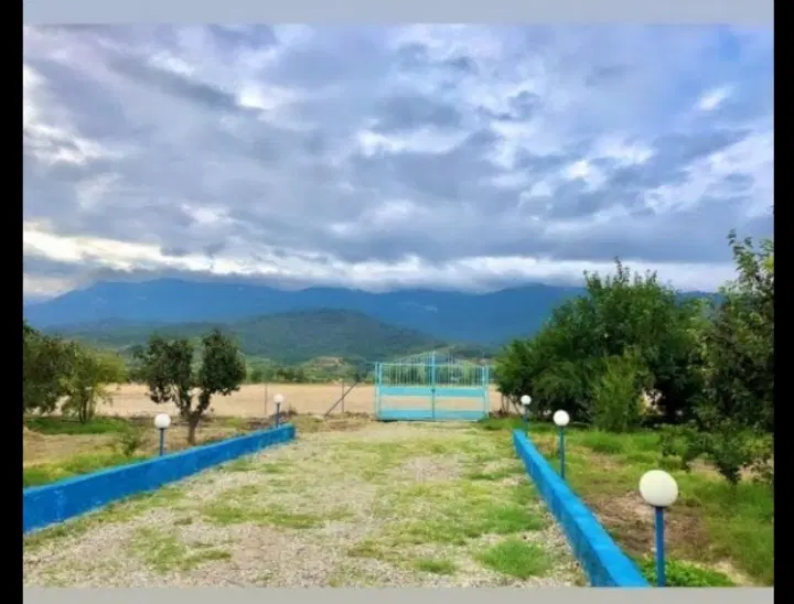 باغ یک هکتاری با چاه مجوز دار و‌ سند تک برگ