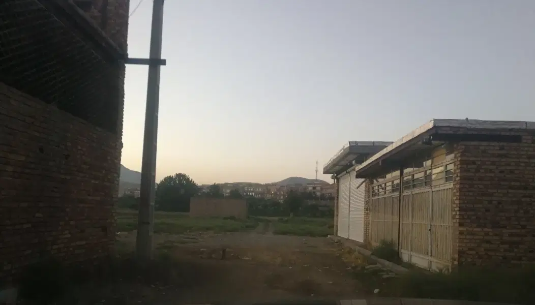 زمین تجاری.میاوق.گلمانخانه.جاده زندان