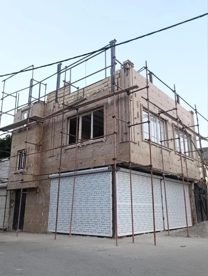 ساختمان دو واحده با دو مغازه دو بر