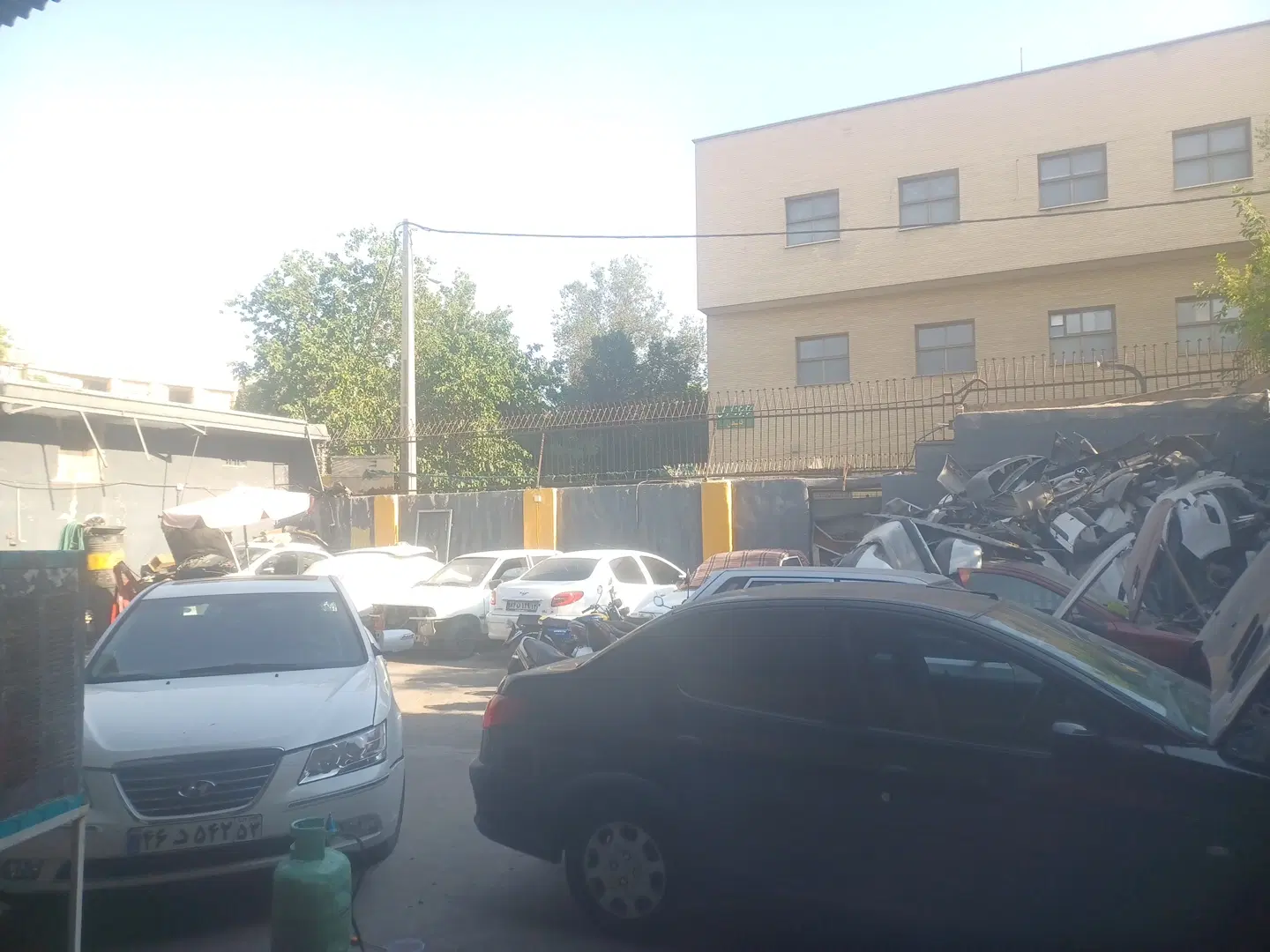 اجاره یک باب مغازه داخل تعمیرگاه با محوطه