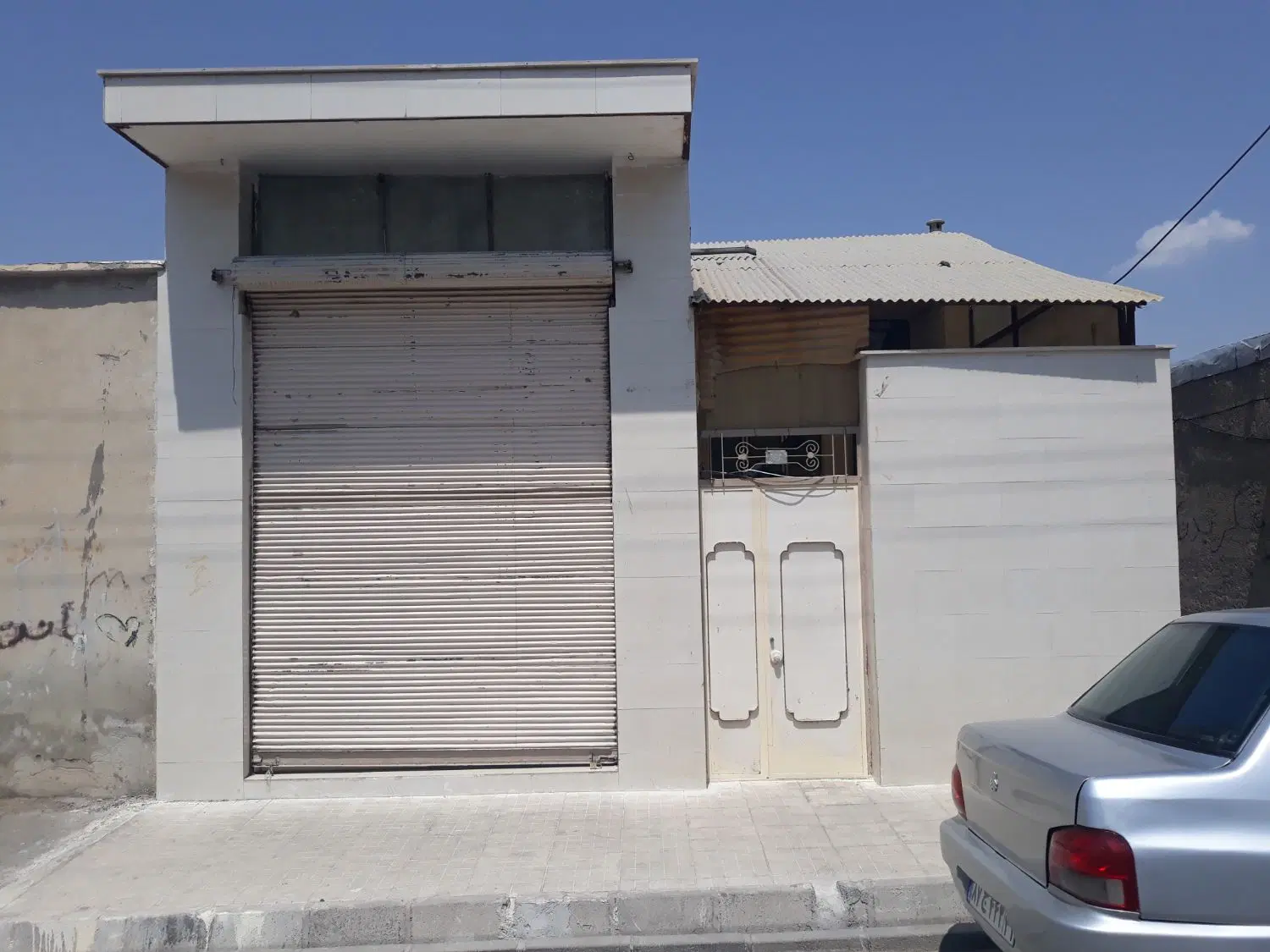 ویلایی با مغازه در خ ۱۶ متری
