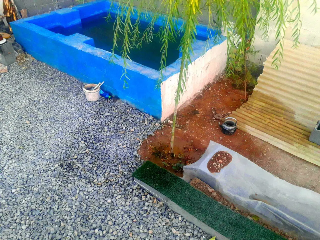 باغ ۶۰۰ متر آب دائم معاوضه خودرو زمین درمحدوده