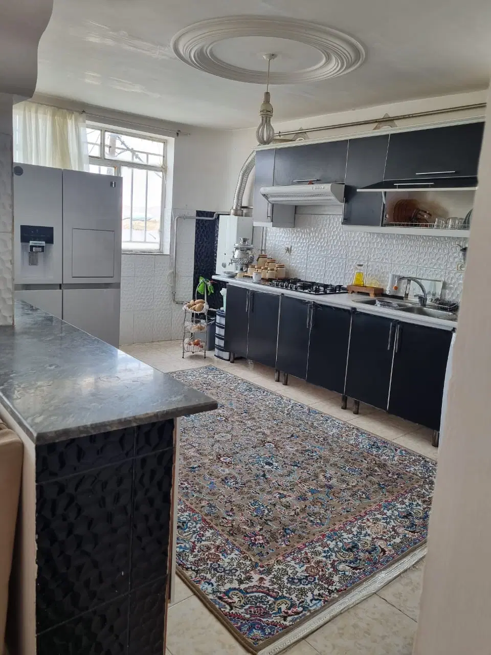 تهاتری ساختمان کردستان با ملک کرج و البرز