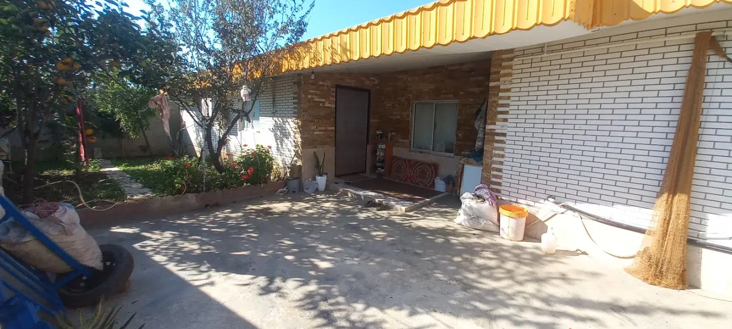 خانه ویلایی با دو دهنه مغازه