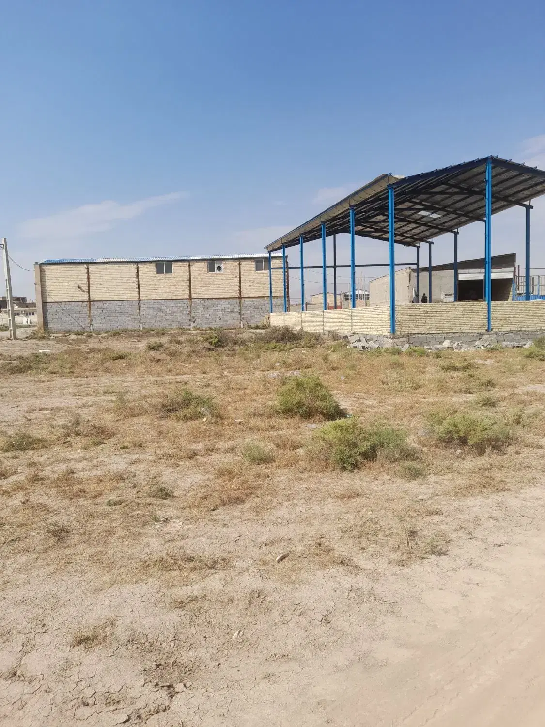 زمین ۲۰۰متر کارگاهی نزدیک شهرک صنعتی