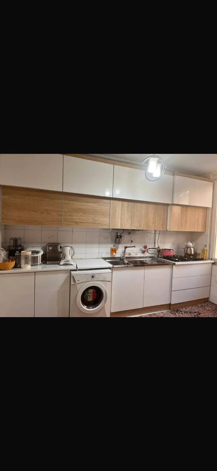 ۱۰۰ م۲ خ طبقه روی همکف با پارکینگ و انباری و بالکن