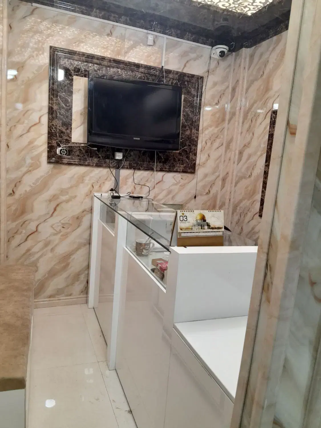 معاوضه مغازه طلافروشی باملک تنکابن وکرمانشاه