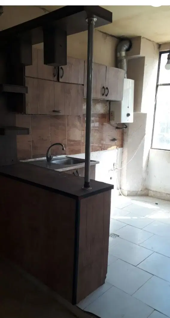 یک واحد پنجاه متری طبقه همکف