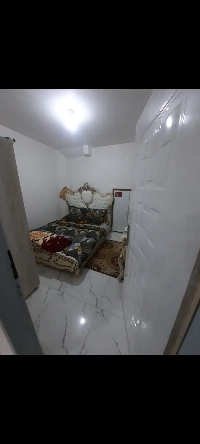 منزل مسکونی ۱۲۵متری همکف با پارکینگ و حیاط
