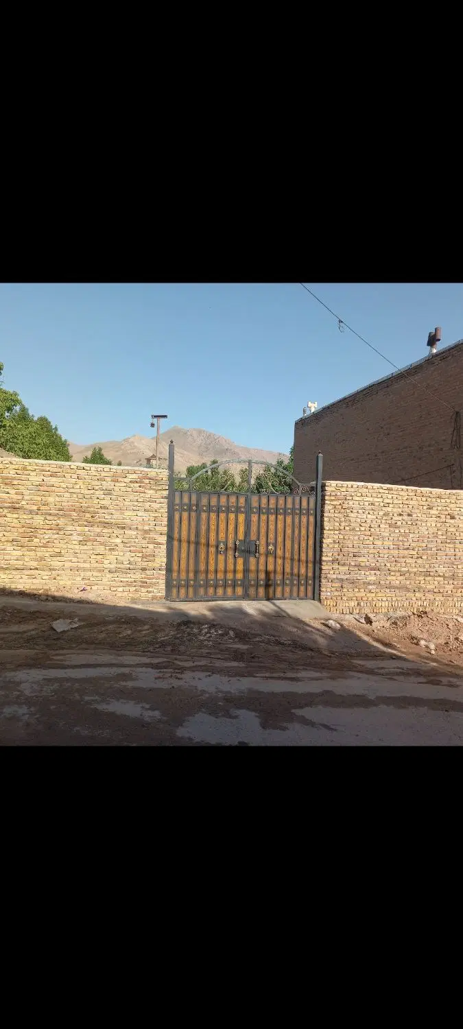 زمین چهار دیواری سند تک برگ جاده طالقان .خوزنان.