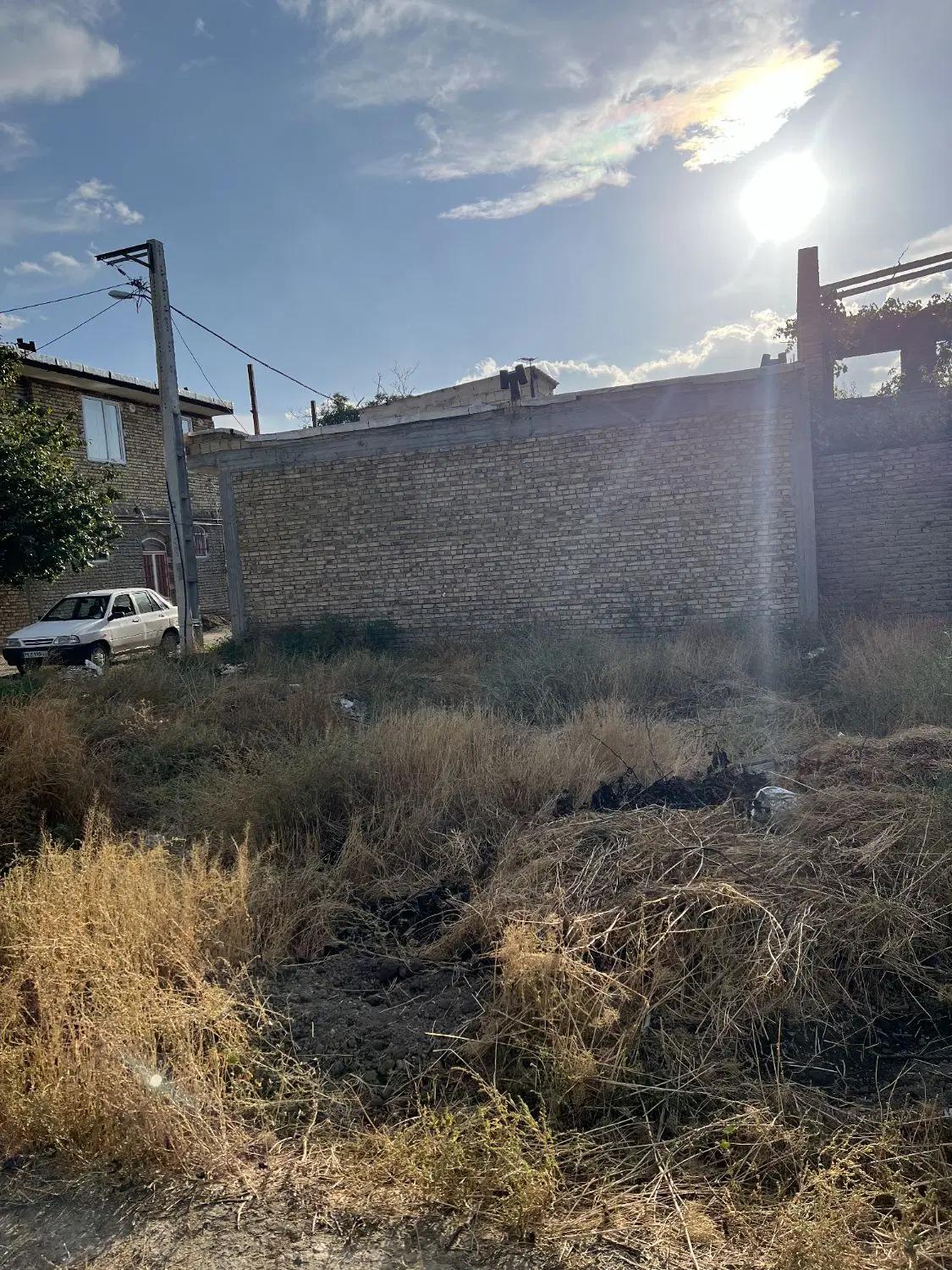 زمین در گوی تپه