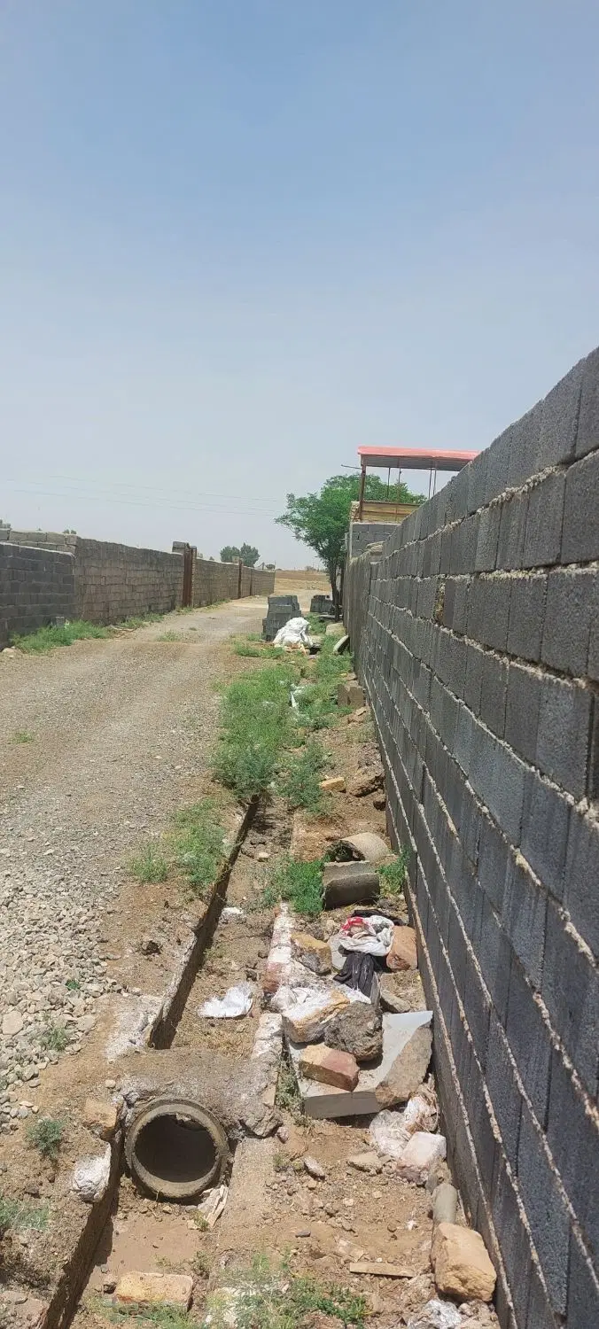 زمین.  باغچه.چهار دیواری دو کله