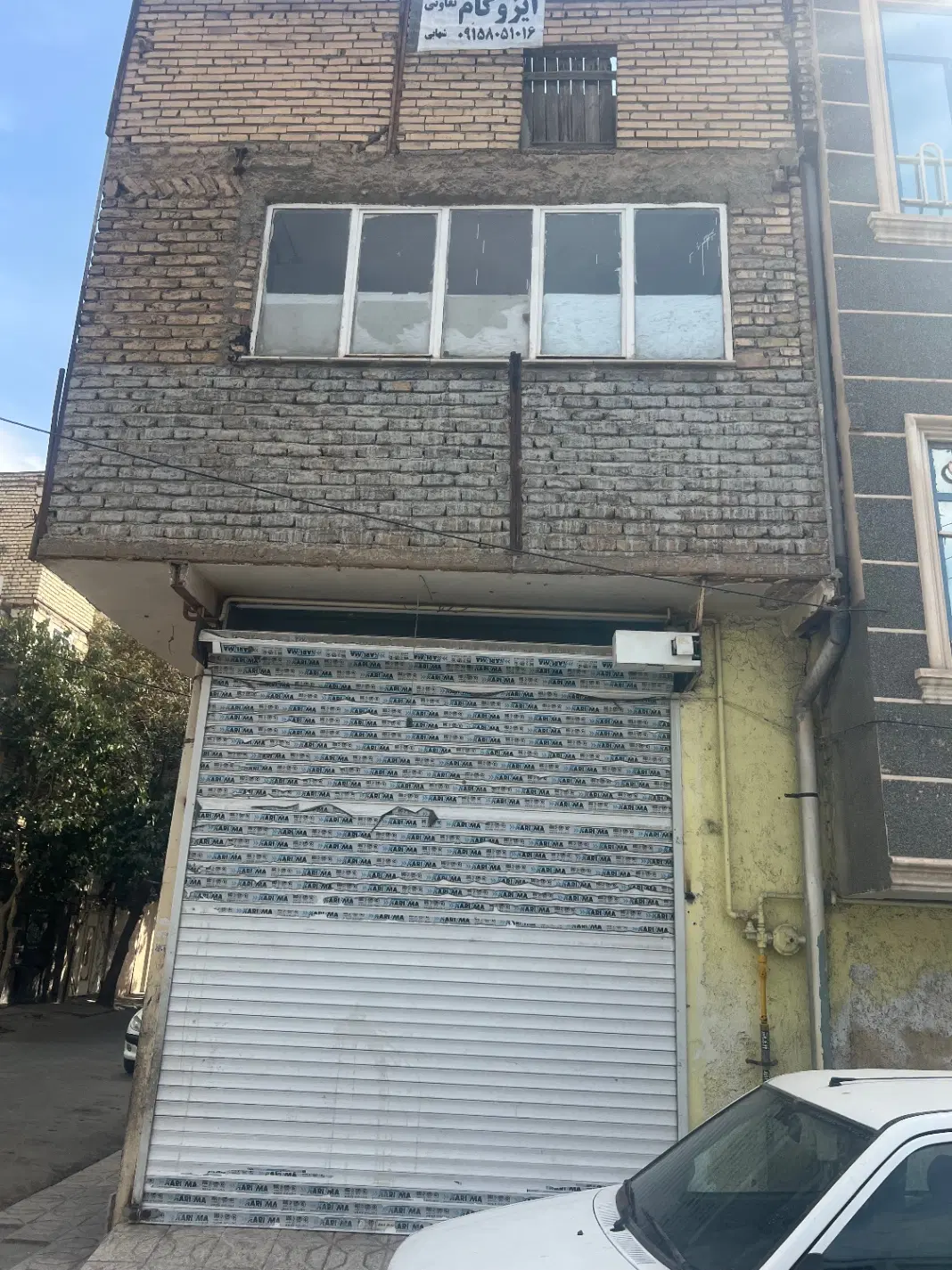 فروش بک باب  مغازه  و یک واحد اپارتمان