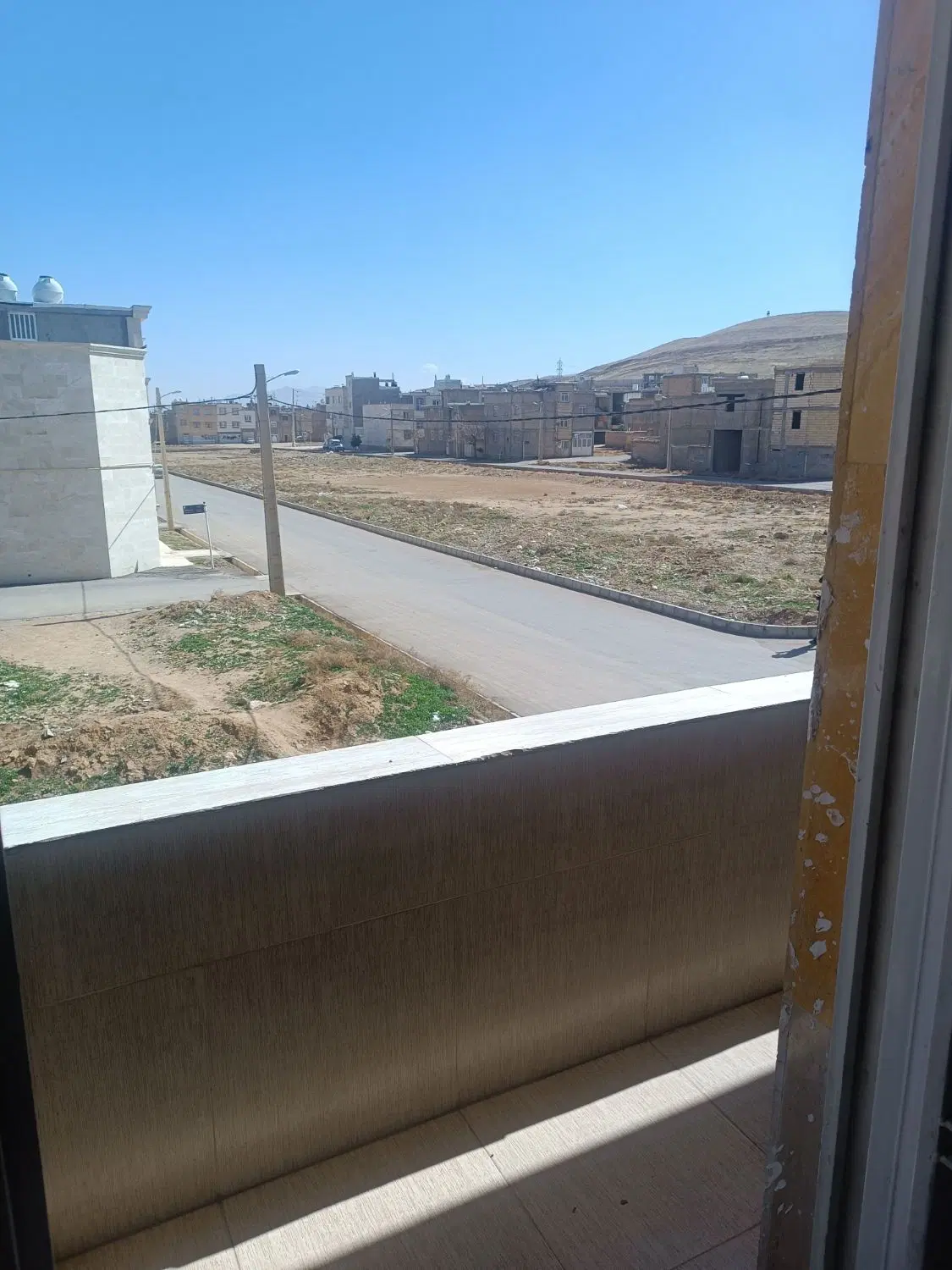 خانه یک طبقه و مغازه