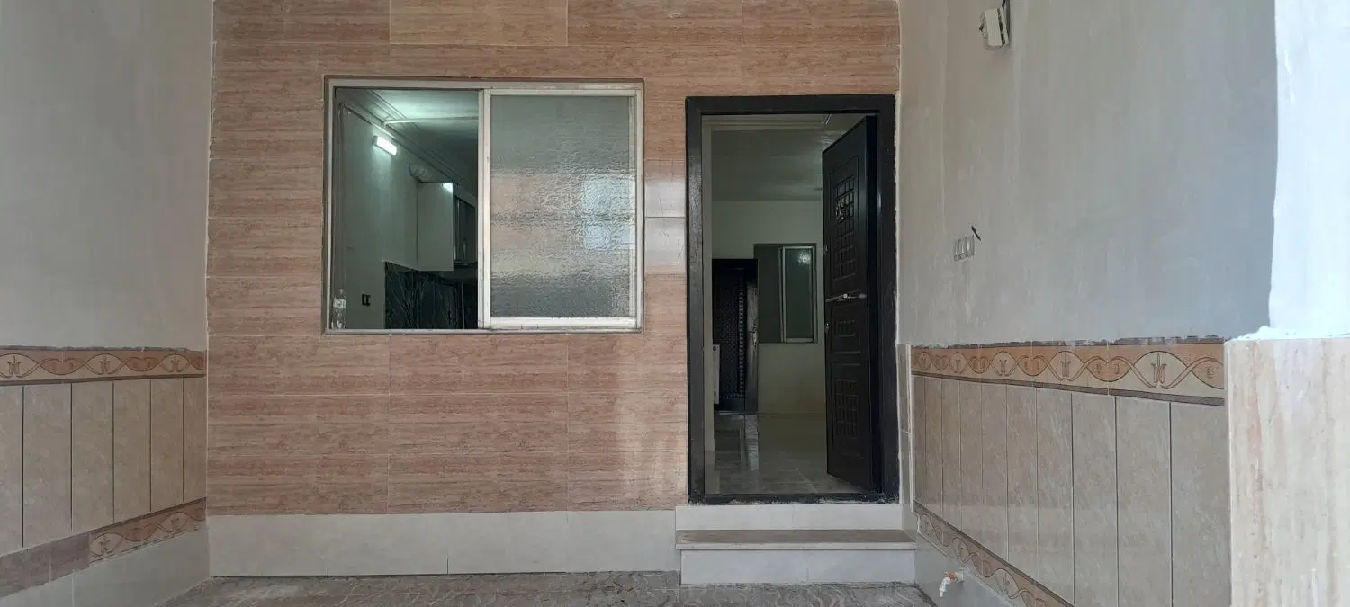 خانه فروشی کاشانی ۲۶ هم کف باپارکینگ ۱۰۸ متر