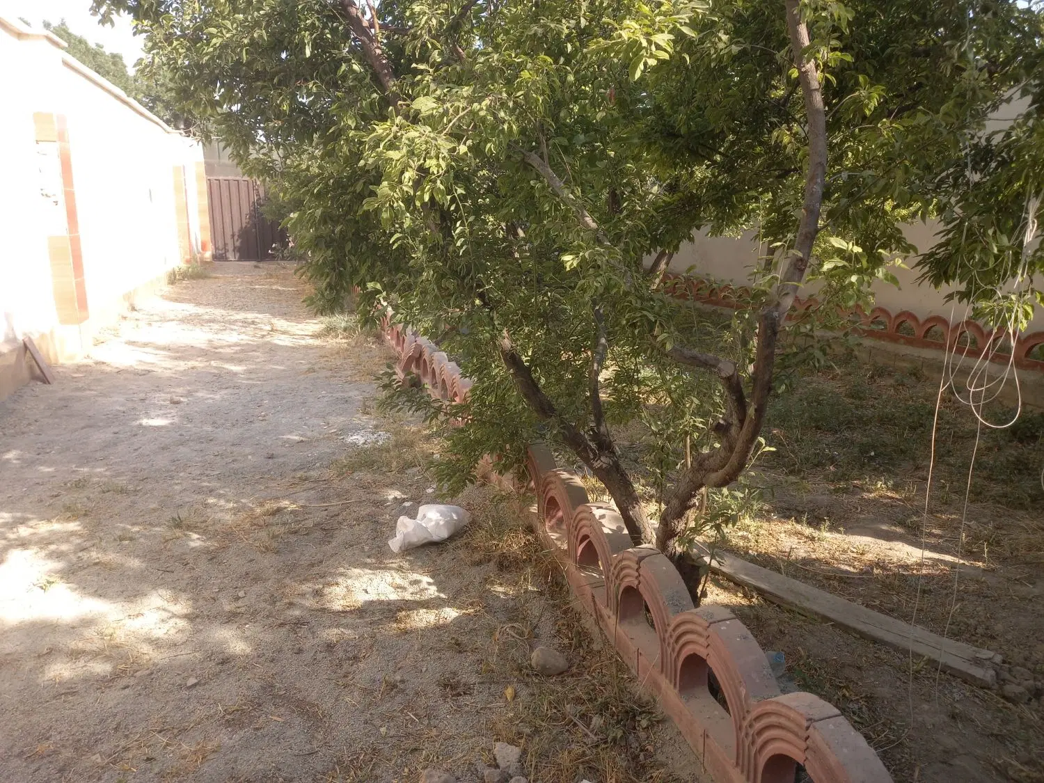 باغچه ۲۵۰متری چهاردیواری سنددار اسفنداباد ملارد