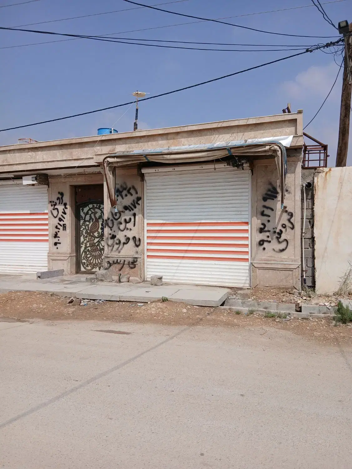 خانه بهمراه دو مغازه در شهرک یاسر