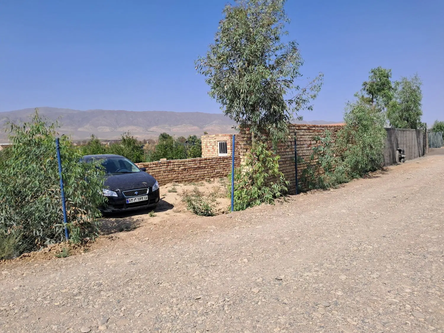 باغ زیبای 700متری دارای برق و سهم اب از چاه عمیق