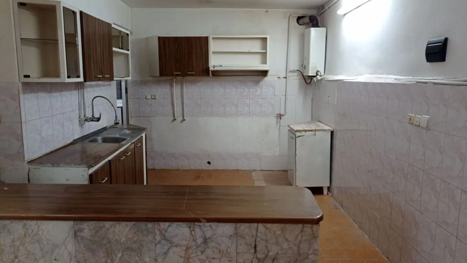 خانه طبقه همکف همراه پارکینگ