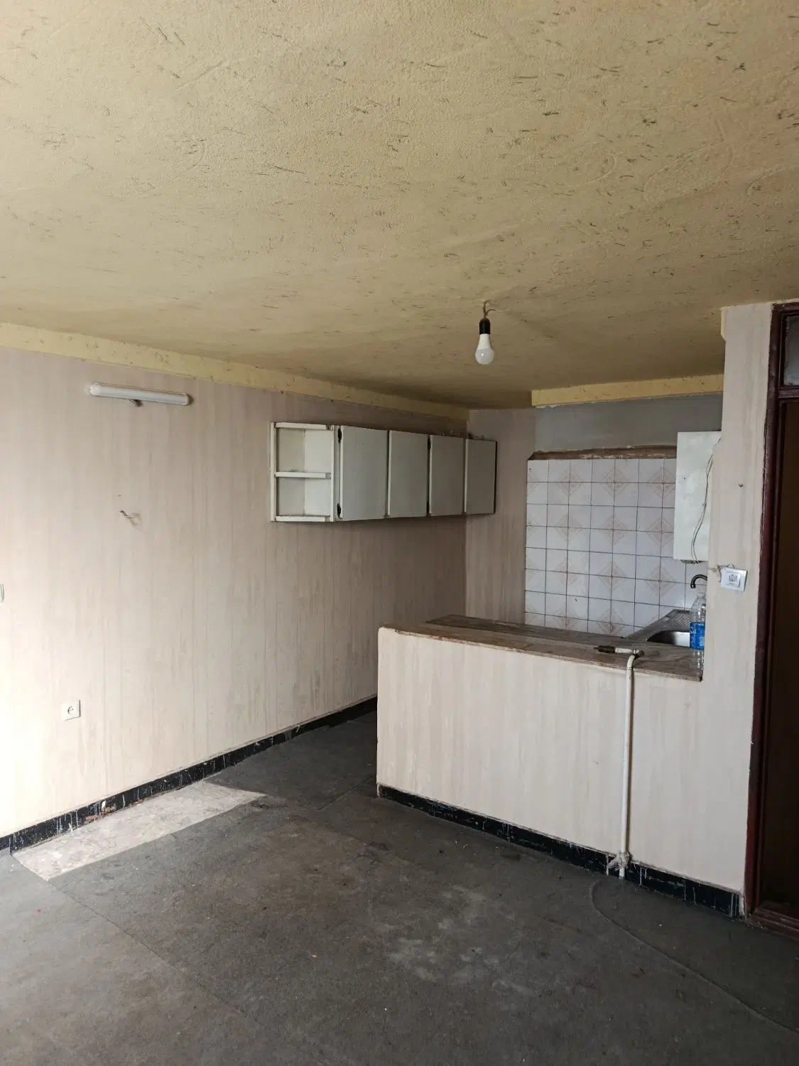 خانه ۵۵متری یک خواب در خیابان بهزاد، حسن فدایی