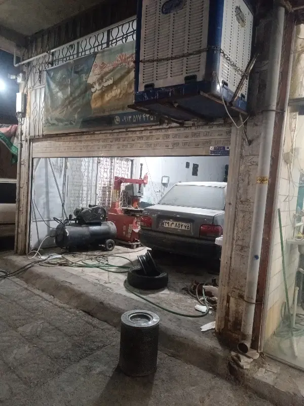 دومغازه واقع در مالک اشتر،وخیابان انقلاب