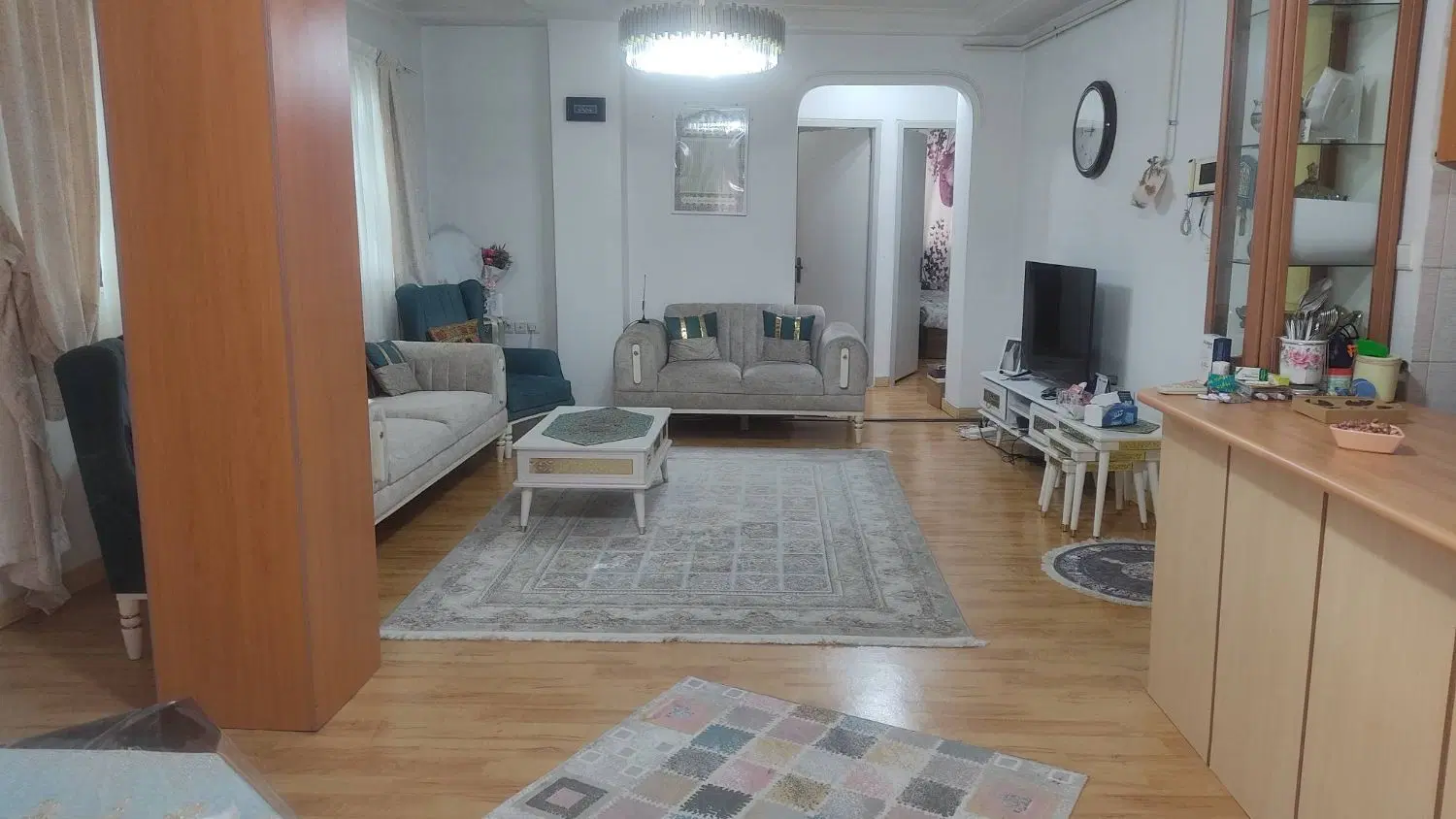 تهاتر یک واحد آپارتمان و زمین مسکونی با ملک