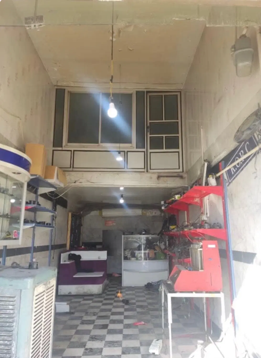 معاوضه مغازه کرمانشاه با خانه در تهران