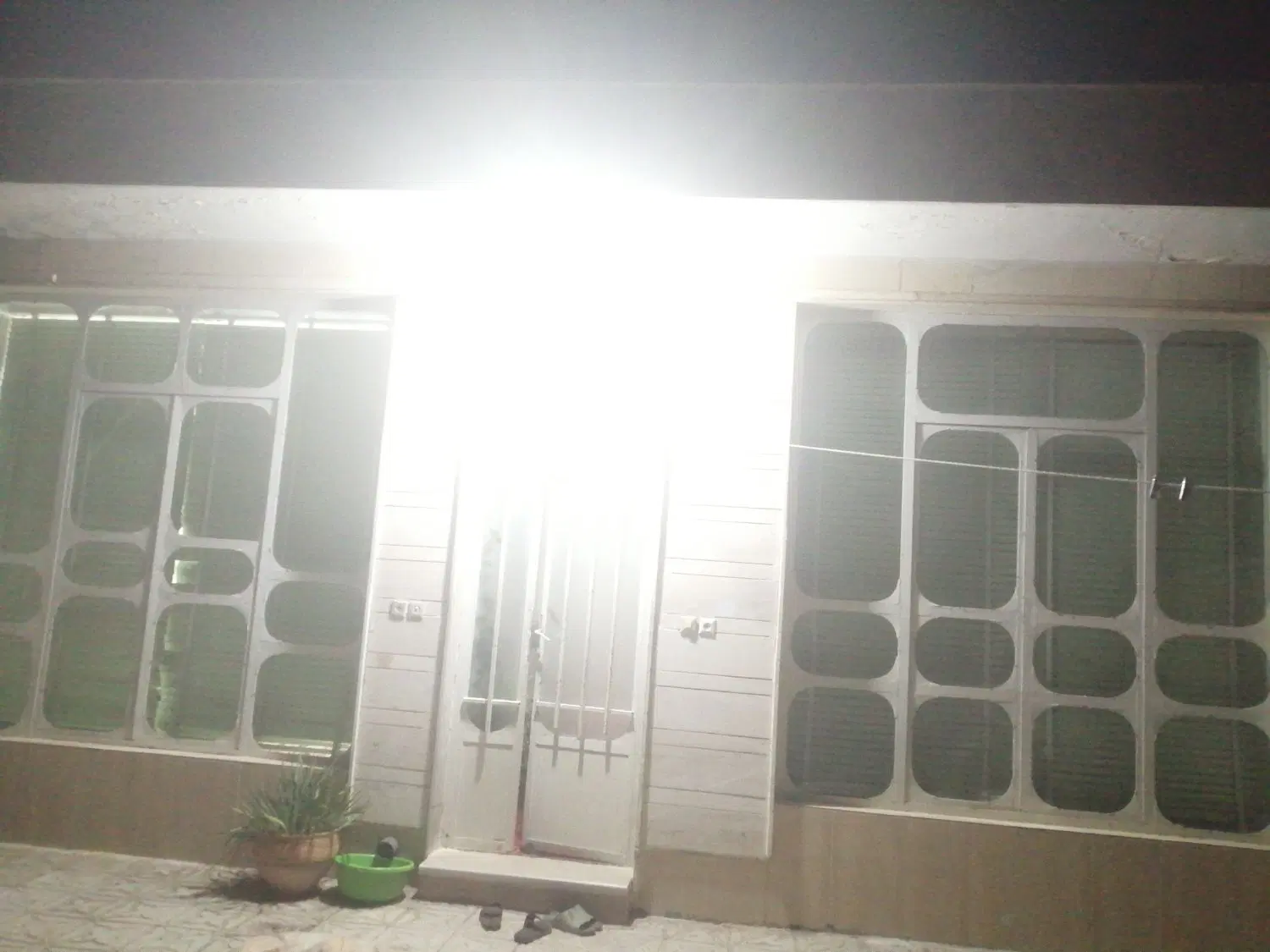 خانه ویلایی دو بر حیاط پارکینگ دار.