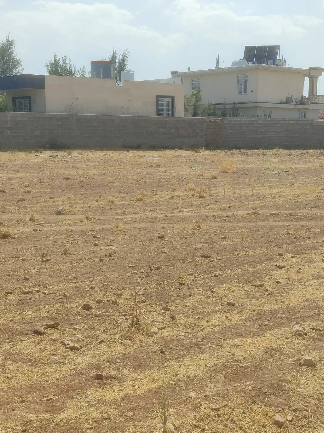 زمین با آب سپیدان هماشهر