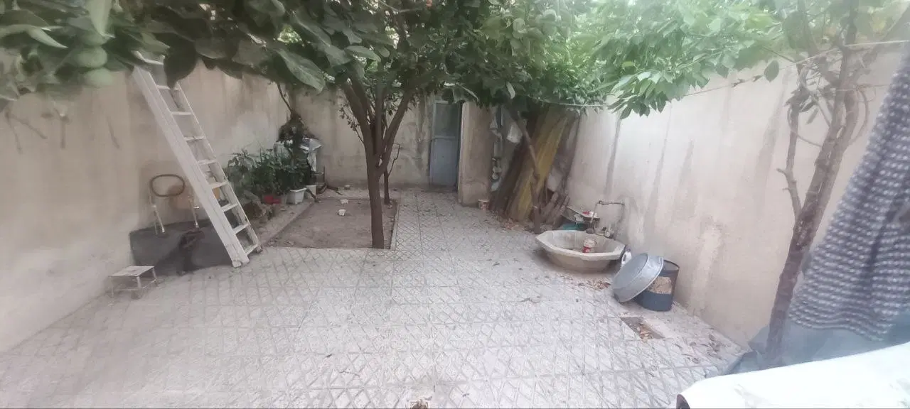 خانه حیاط دار_۱۰۰متر_سند تک برگ
