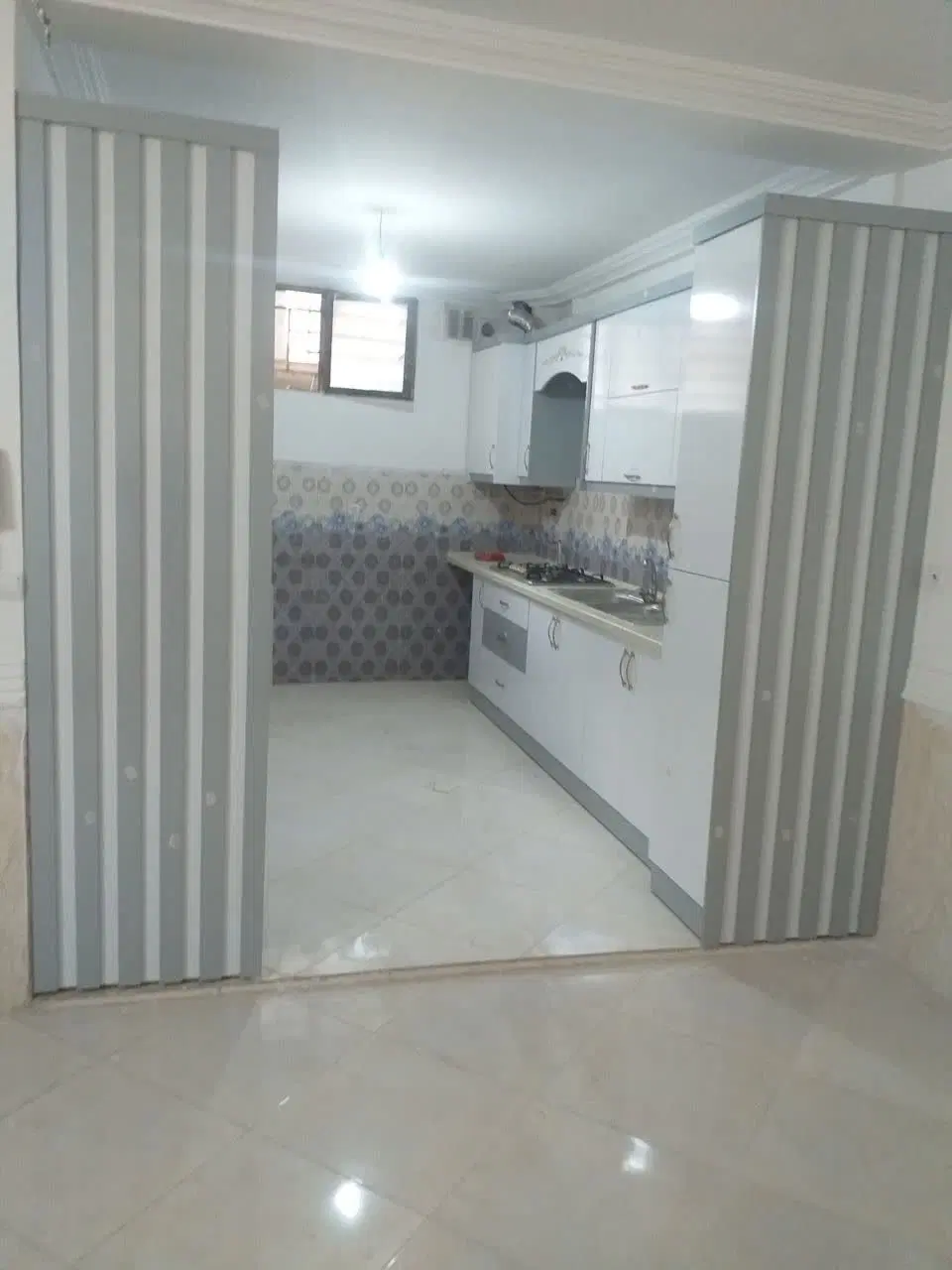 منزل آپارتمانی طبقه همکف 65متری