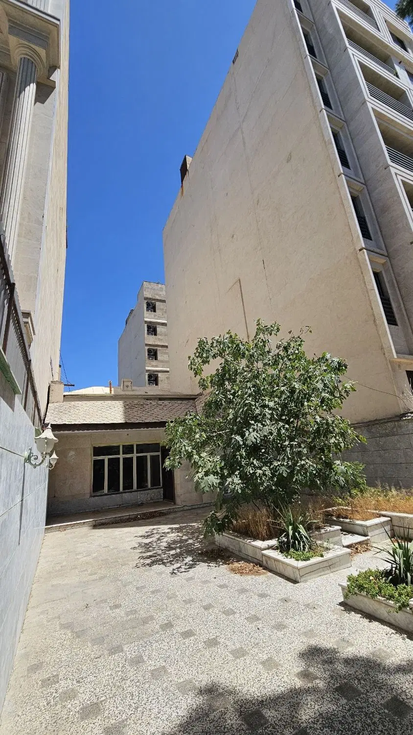 تهاتر زمین با دو واحد آپارتمان