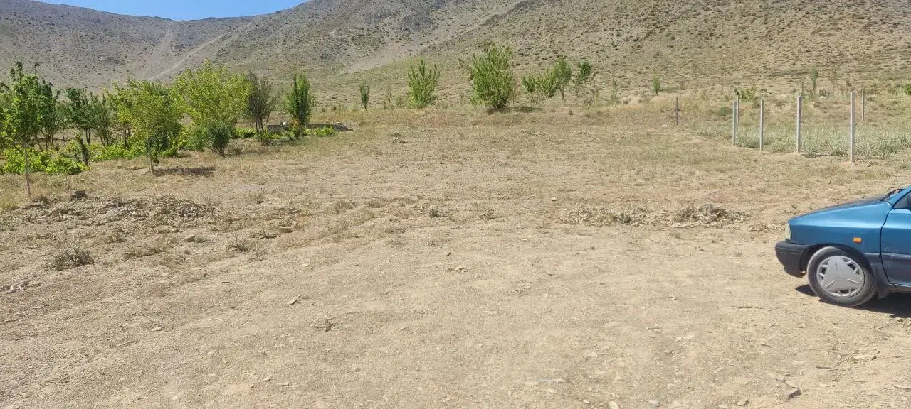 زمین باغی با آب در منطقه مودر  نزدیک شهر