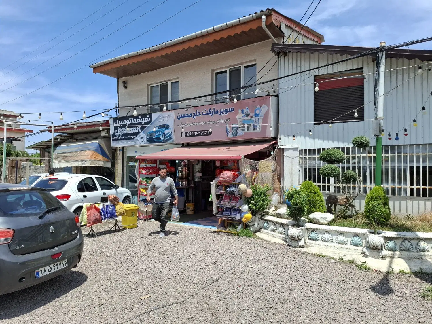 ملک تجاری بر جاده اصلی رامسر به رودسر .در حسن سرا