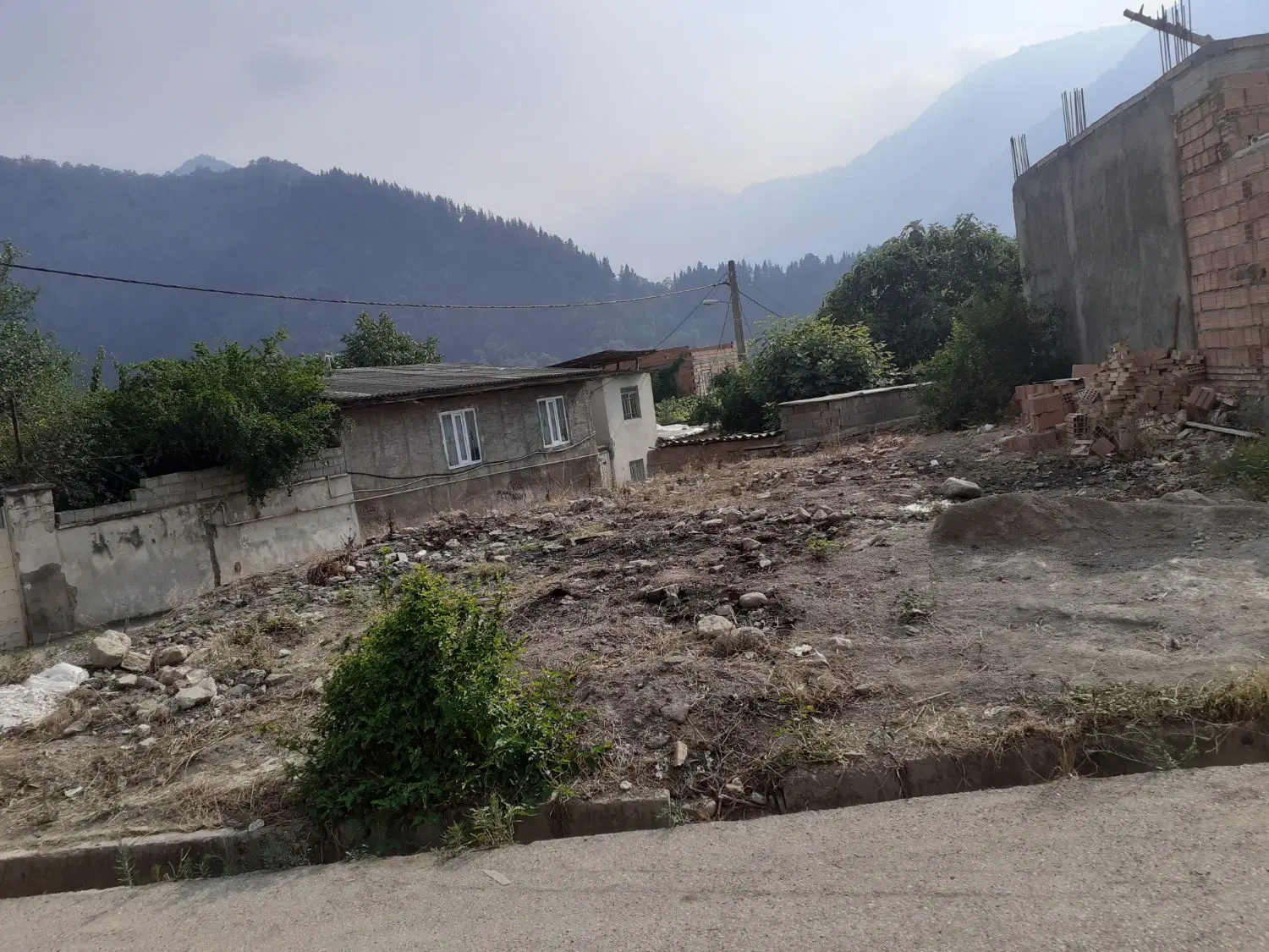 زمین مسکونی وخانه کلنگی