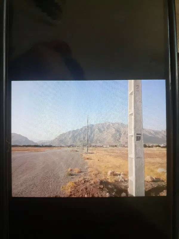 زمین شهرک بهارستان روبرو کارخانه زمزم